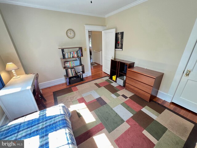6206 Pinehurst Rd, Baltimore, MD 21212 - living area with wood finished floors, baseboards, and crown molding