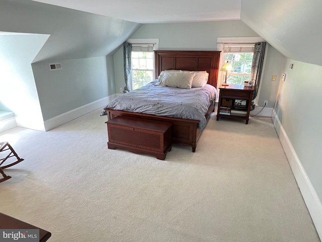 6206 Pinehurst Rd, Baltimore, MD 21212 - bedroom featuring lofted ceiling, light colored carpet, multiple windows, and baseboards