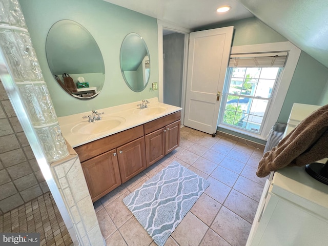 6206 Pinehurst Rd, Baltimore, MD 21212 - full bath with double vanity, lofted ceiling, recessed lighting, and tile patterned floors