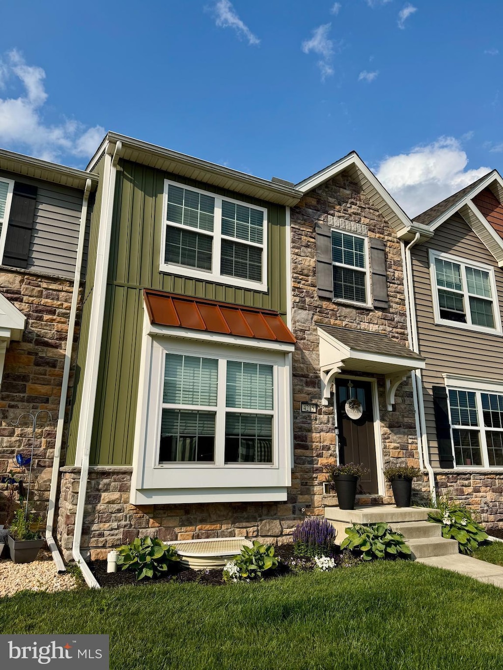 4215 Wild Orchid Ln, Enola, PA 17025 - view of front of house featuring stone siding and board and batten siding