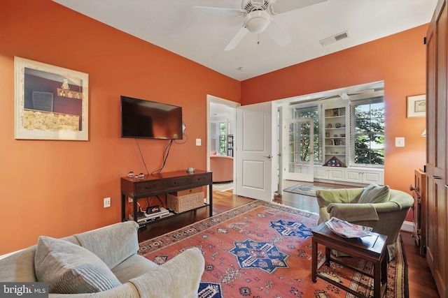 1023 N Royal St Unit 207, Alexandria, VA 22314 - living room featuring wood finished floors, ceiling fan, plenty of natural light, and baseboards