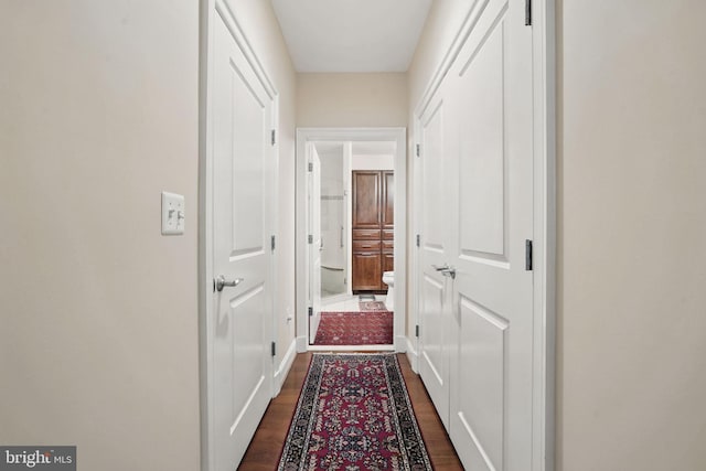 1023 N Royal St Unit 207, Alexandria, VA 22314 - corridor with dark wood-style floors and baseboards