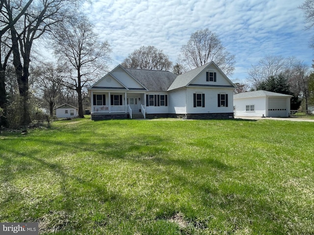 10963 Poplar Dr, Lusby, MD 20657 - view of front of home featuring covered porch, a front lawn, a detached garage, and roof with shingles