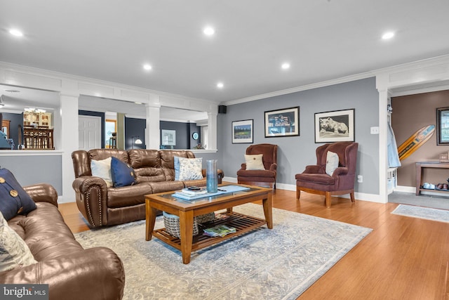 872 Kilby Dr, Yardley, PA 19067 - living area featuring ornate columns, ornamental molding, light wood-style flooring, and recessed lighting
