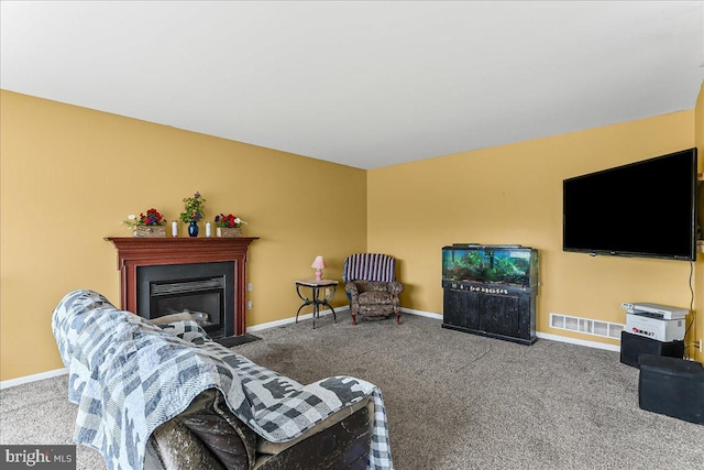 213 Joseph Rd, Oxford, PA 19363 - living room with carpet floors, baseboards, and a fireplace with flush hearth