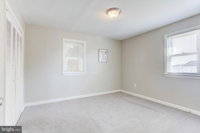 3835 26th Ave, Temple Hills, MD 20748 - unfurnished bedroom featuring carpet floors, baseboards, and a closet