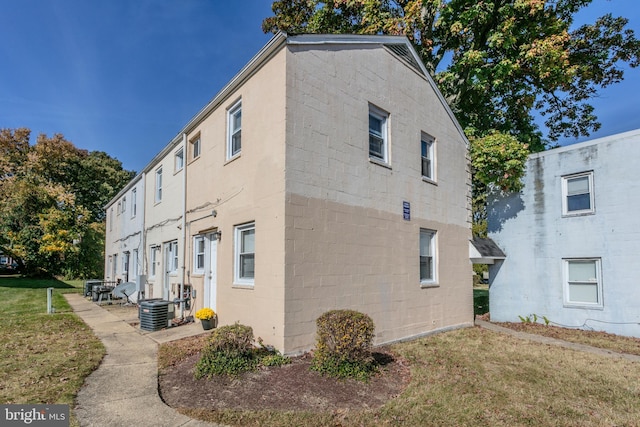 3835 26th Ave, Temple Hills, MD 20748 - view of property exterior with a yard and central AC unit