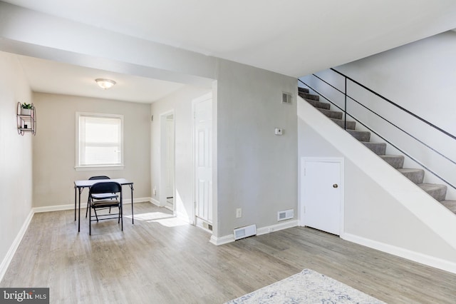 3835 26th Ave, Temple Hills, MD 20748 - interior space featuring wood finished floors, baseboards, and stairs