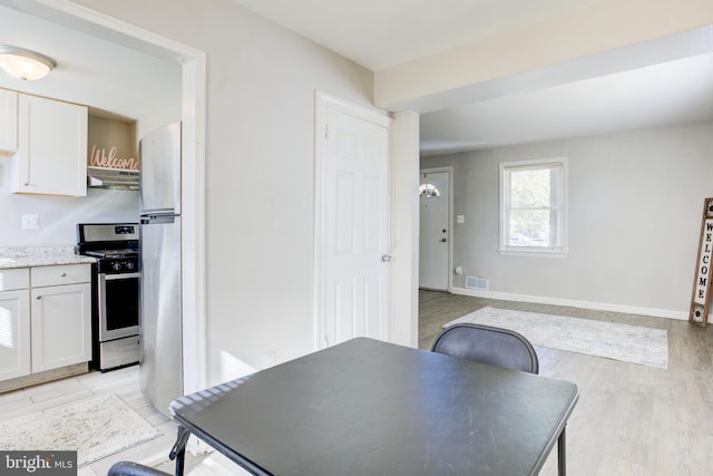 3835 26th Ave, Temple Hills, MD 20748 - dining area featuring light wood finished floors and baseboards