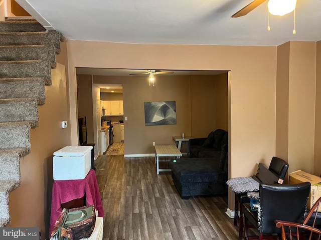 312 W Princess St, York, PA 17401 - living area with a ceiling fan, dark wood-style flooring, and stairs