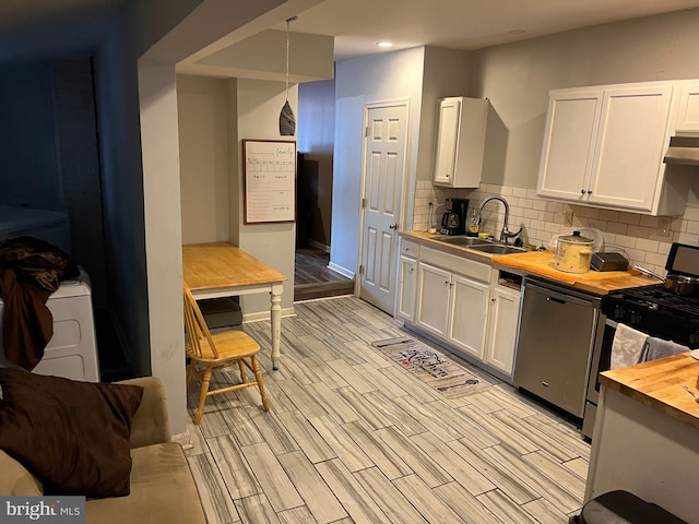 312 W Princess St, York, PA 17401 - kitchen featuring a sink, butcher block countertops, dishwasher, range with gas cooktop, and white cabinets