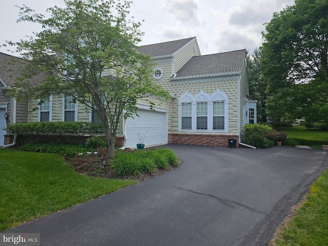 11 Musket Ct Unit 53, West Chester, PA 19380 - view of front of house featuring driveway, an attached garage, brick siding, and a shingled roof