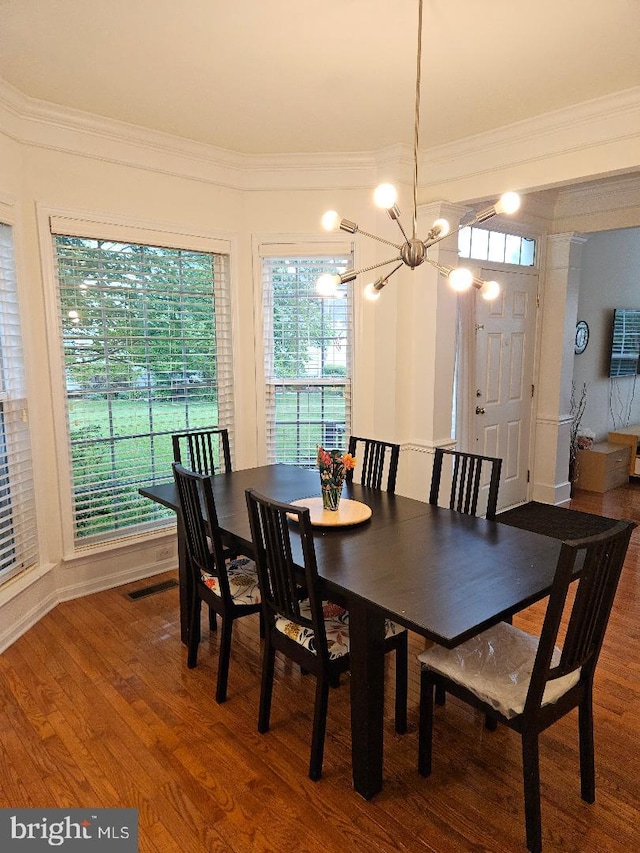 11 Musket Ct Unit 53, West Chester, PA 19380 - dining room featuring ornamental molding, a chandelier, and wood finished floors