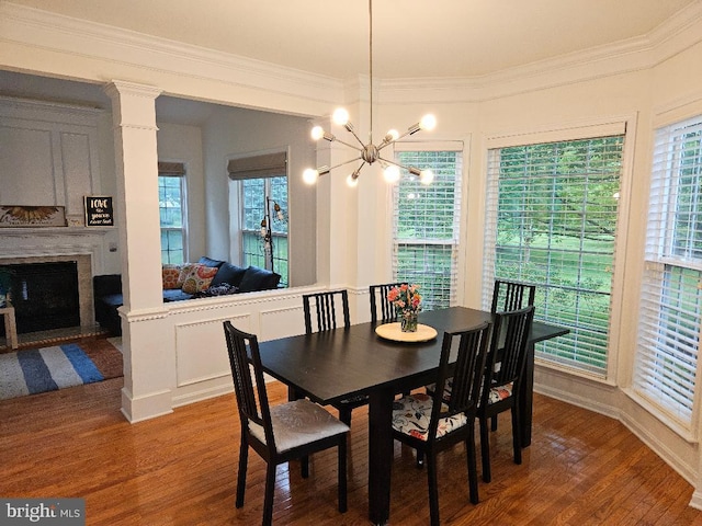 11 Musket Ct Unit 53, West Chester, PA 19380 - dining space with wood finished floors, crown molding, a chandelier, and plenty of natural light