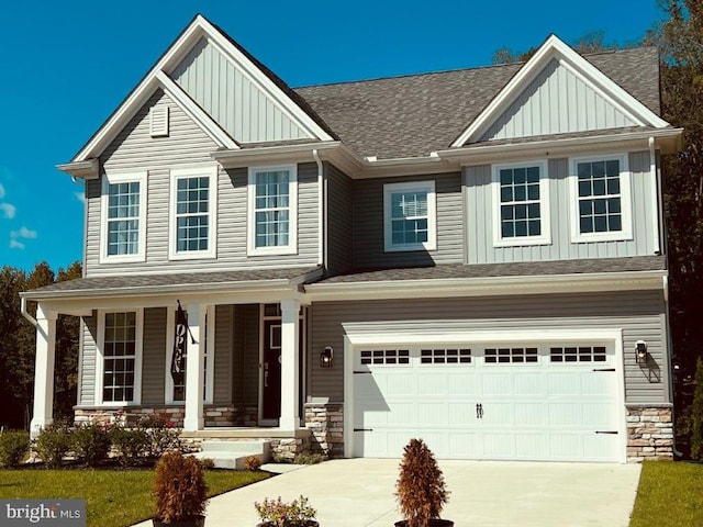 420 Bellflower Way Merion Plan, Unit Merion Plan, Townsend, DE 19734 - craftsman-style home featuring board and batten siding, a porch, concrete driveway, a shingled roof, and an attached garage