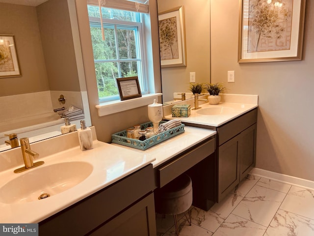 420 Bellflower Way Merion Plan, Unit Merion Plan, Townsend, DE 19734 - bathroom featuring vanity, marble finish floors, baseboards, and a bath