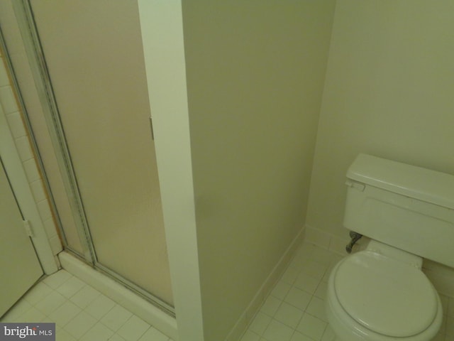 6 Bailiffs Ct Unit 301, Lutherville Timonium, MD 21093 - bathroom with toilet, tile patterned floors, and a shower stall