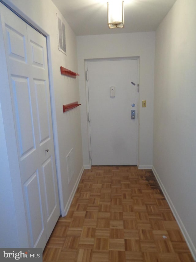 6 Bailiffs Ct Unit 301, Lutherville Timonium, MD 21093 - doorway to outside featuring baseboards