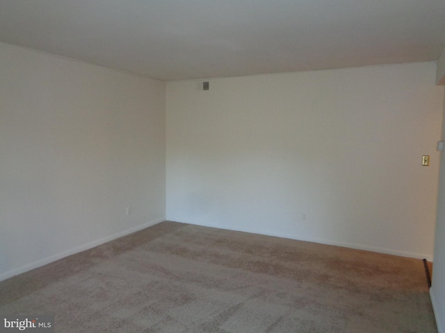 6 Bailiffs Ct Unit 301, Lutherville Timonium, MD 21093 - carpeted empty room featuring baseboards