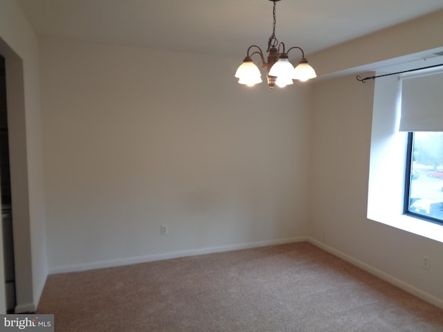 6 Bailiffs Ct Unit 301, Lutherville Timonium, MD 21093 - unfurnished room with light carpet, a chandelier, and baseboards