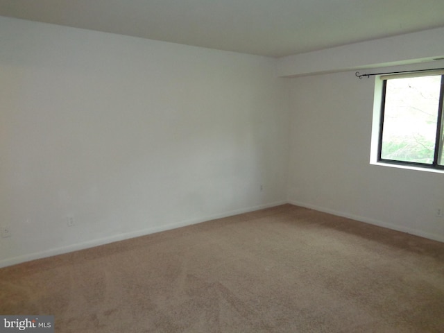 6 Bailiffs Ct Unit 301, Lutherville Timonium, MD 21093 - spare room featuring carpet flooring and baseboards
