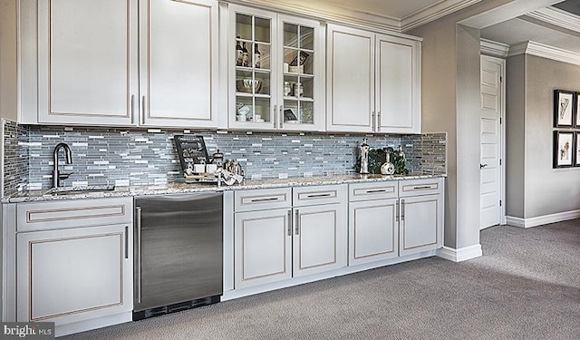 2022 Saint James Rd, Accokeek, MD 20607 - bar featuring crown molding, carpet floors, fridge, and backsplash