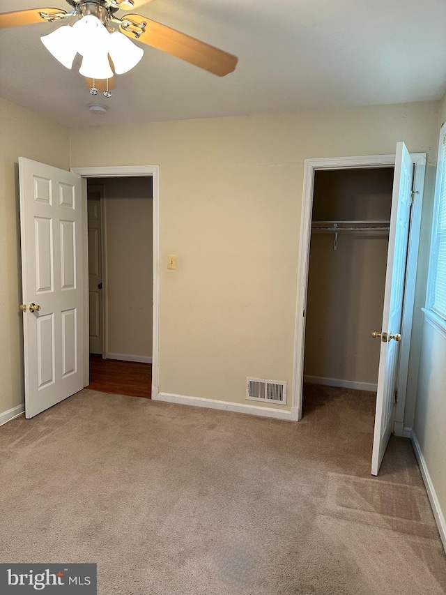 2010 Jameson St, Temple Hills, MD 20748 - unfurnished bedroom featuring carpet, a closet, and ceiling fan