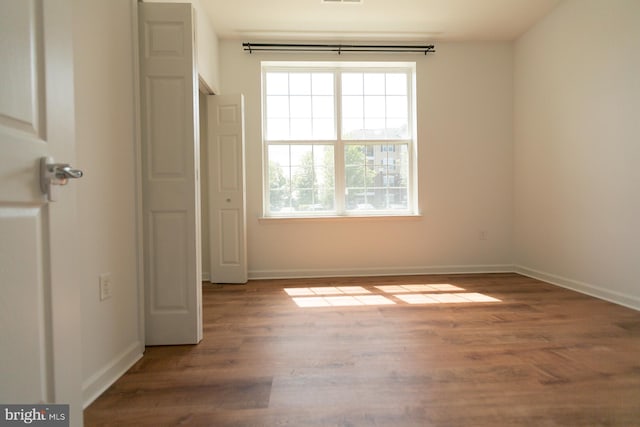 1115 Halifax Pl, Hamilton, NJ 08619 - unfurnished bedroom featuring wood finished floors and baseboards