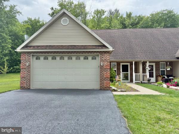 104 Beverly Blvd, Fayetteville, PA 17222 - single story home with brick siding, asphalt driveway, a garage, a shingled roof, and a front lawn