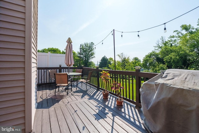 1520 Villa Rd, Wilmington, DE 19809 - wooden deck with outdoor dining area and a grill