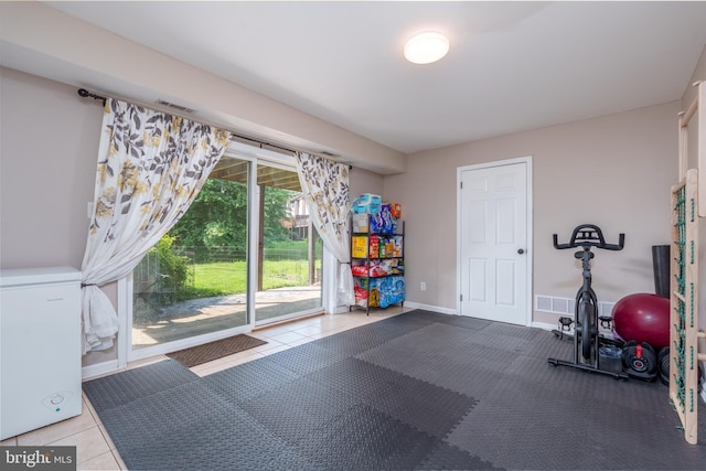 1520 Villa Rd, Wilmington, DE 19809 - exercise room with tile patterned flooring and baseboards