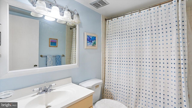 28 Allegheny Ave Unit 2505, Baltimore, MD 21204 - bathroom featuring vanity, toilet, and a shower with curtain