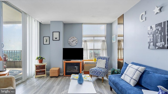 28 Allegheny Ave Unit 2505, Baltimore, MD 21204 - living room featuring wood finished floors and expansive windows