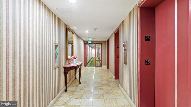 28 Allegheny Ave Unit 2505, Baltimore, MD 21204 - hall featuring baseboards, elevator, wallpapered walls, and recessed lighting