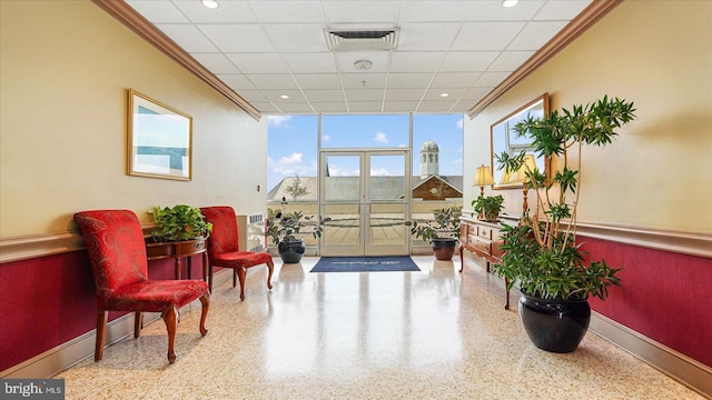 28 Allegheny Ave Unit 2505, Baltimore, MD 21204 - building lobby with ornamental molding, expansive windows, and recessed lighting