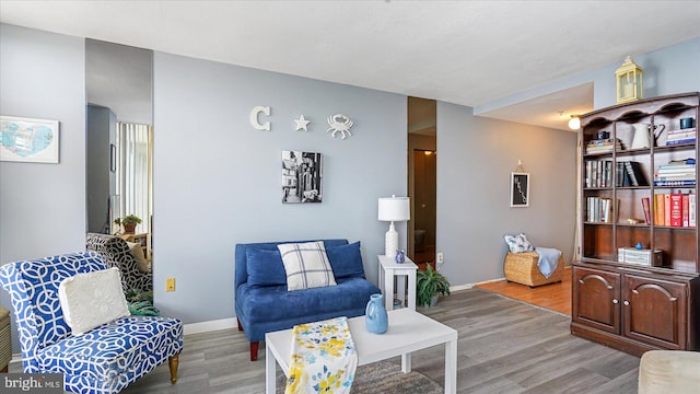 28 Allegheny Ave Unit 2505, Baltimore, MD 21204 - living room with light wood-style flooring and baseboards