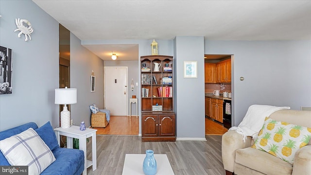 28 Allegheny Ave Unit 2505, Baltimore, MD 21204 - living area with light wood-style flooring