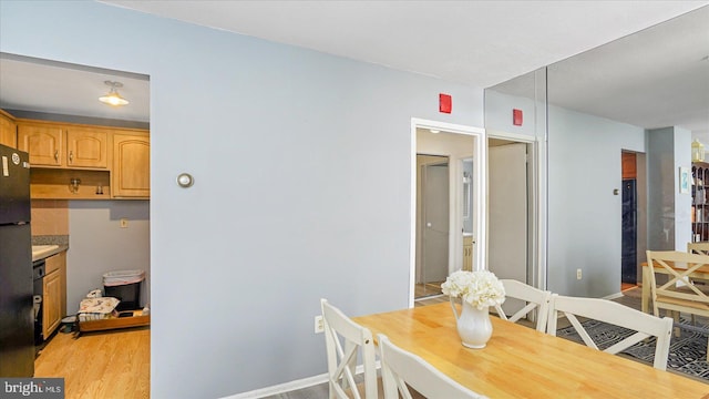 28 Allegheny Ave Unit 2505, Baltimore, MD 21204 - dining space with light wood-type flooring