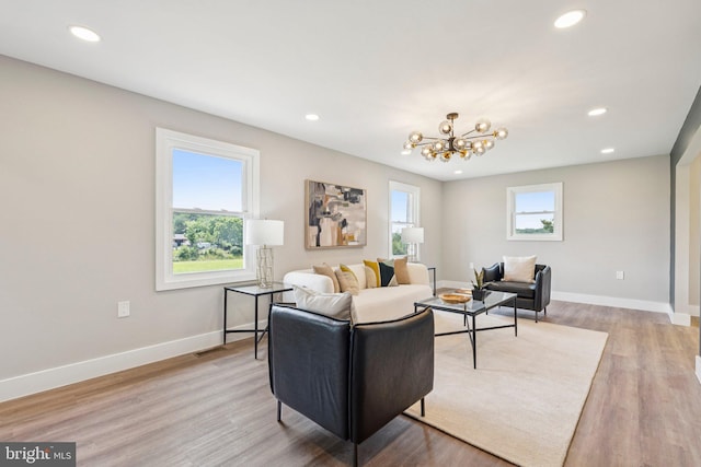 977 W Parkins Mill Rd, Winchester, VA 22602 - living room featuring recessed lighting, a chandelier, and wood finished floors