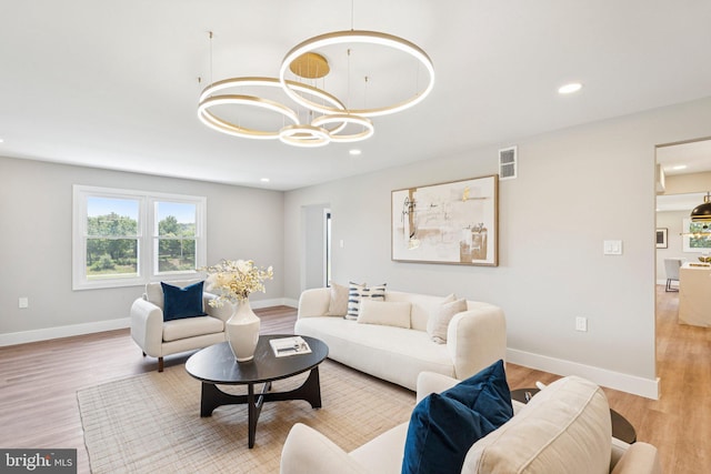 977 W Parkins Mill Rd, Winchester, VA 22602 - living area with a chandelier, light wood-type flooring, and recessed lighting