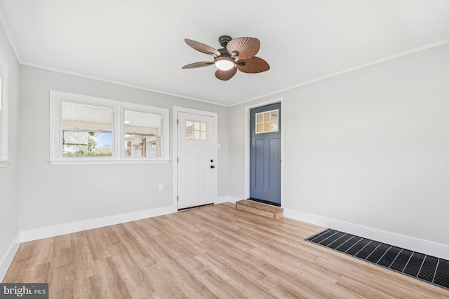 977 W Parkins Mill Rd, Winchester, VA 22602 - entrance foyer featuring light wood-type flooring, ornamental molding, ceiling fan, and healthy amount of natural light