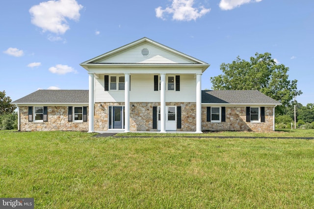 977 W Parkins Mill Rd, Winchester, VA 22602 - neoclassical / greek revival house with stone siding, a front lawn, and a shingled roof