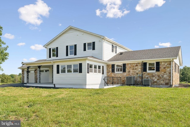 977 W Parkins Mill Rd, Winchester, VA 22602 - back of property featuring a lawn and stone siding