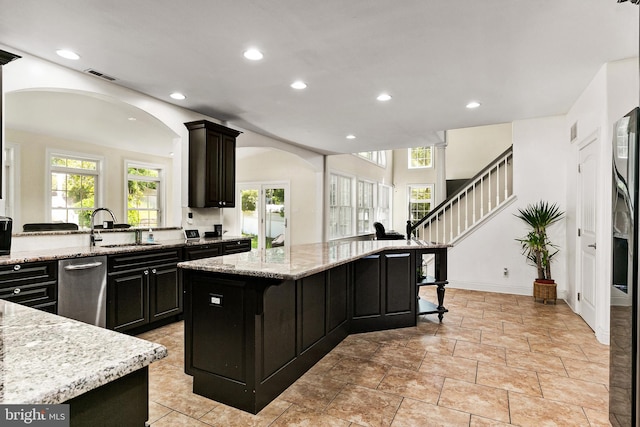 99 Kresson Gibbsboro Rd, Voorhees, NJ 08043 - kitchen with a sink, arched walkways, recessed lighting, dark cabinets, and a center island