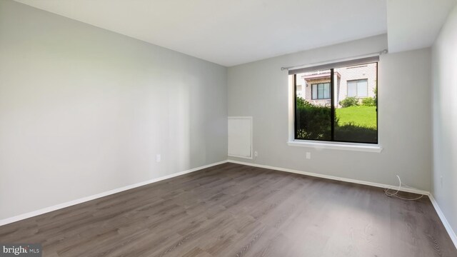7205 Hilltop Dr Unit 95, Brookhaven, PA 19015 - spare room featuring wood finished floors and baseboards