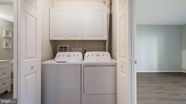 7205 Hilltop Dr Unit 95, Brookhaven, PA 19015 - laundry area with cabinet space, washer and dryer, wood finished floors, and baseboards