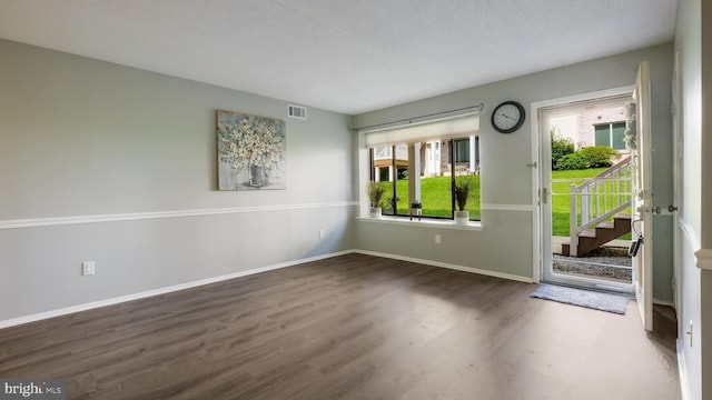 7205 Hilltop Dr Unit 95, Brookhaven, PA 19015 - spare room with wood finished floors and baseboards