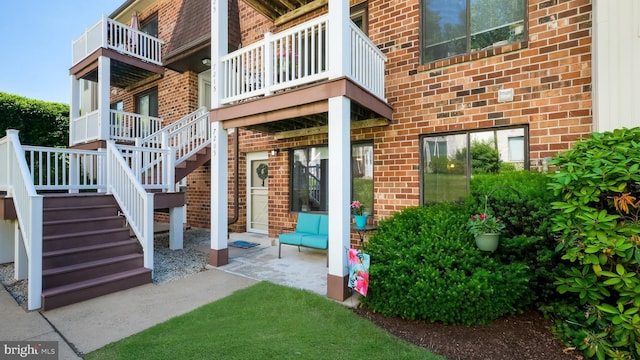 7205 Hilltop Dr Unit 95, Brookhaven, PA 19015 - view of exterior entry with brick siding