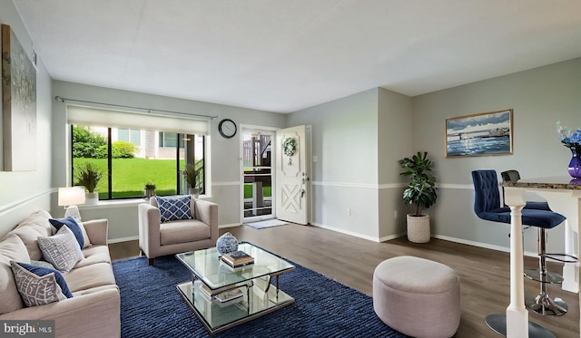 7205 Hilltop Dr Unit 95, Brookhaven, PA 19015 - living area with wood finished floors and baseboards