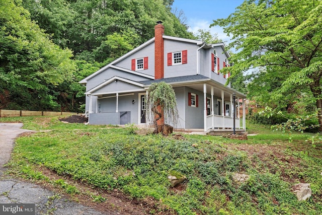 2046 Church Rd, Hummelstown, PA 17036 - view of front of property featuring a chimney and a porch